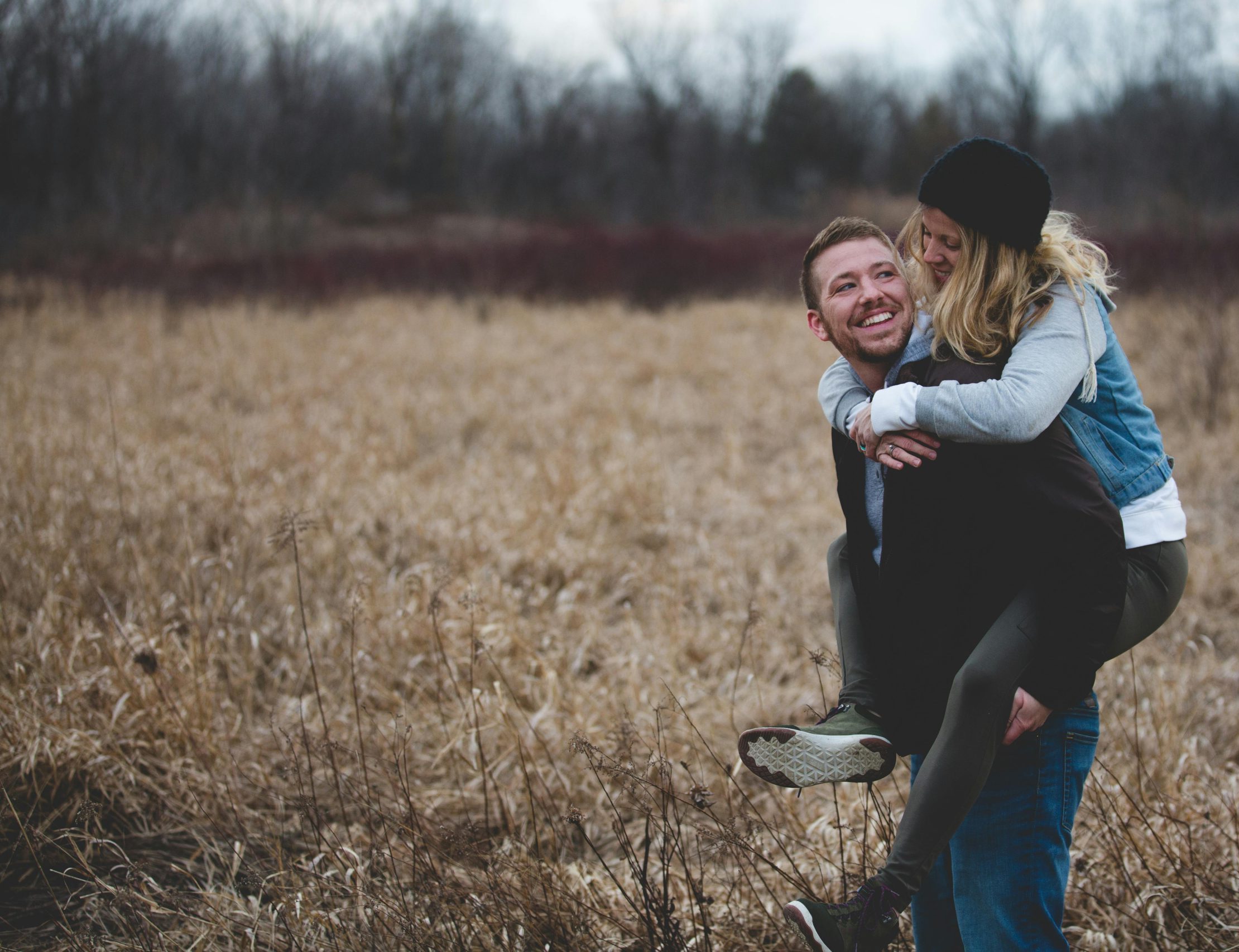 Happy couple outside in fall